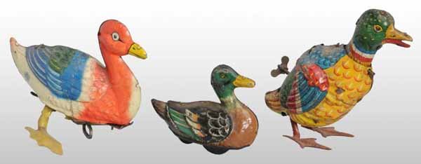 Lot of 3: Tin Litho Duck Wind-Up & Friction Toys.: Description German. One toy is marked "SG Made in Germany", one is marked "Made in Germany", and one is marked "JHL". One of the wind-up ducks squeaks while it walks. Toys are dirty and would clean to