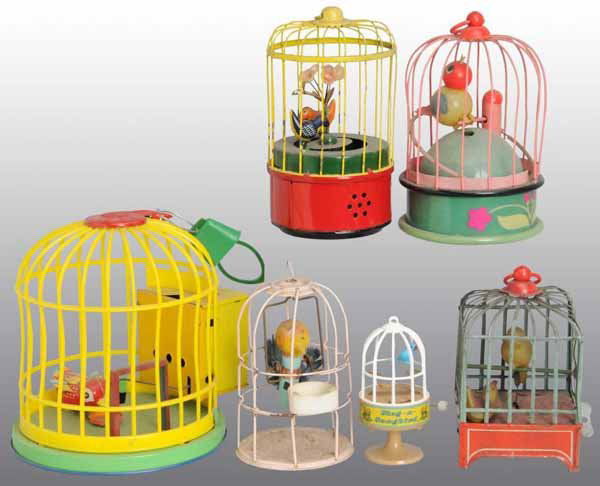 Lot of 6: Bird in Cage Wind-Up Toys.: Description German and Japanese. Working. Some are celluloid and some are tin. Includes one toy that is more contemporary than the others and one toy that does not have a wind-up mechanism. Condition
