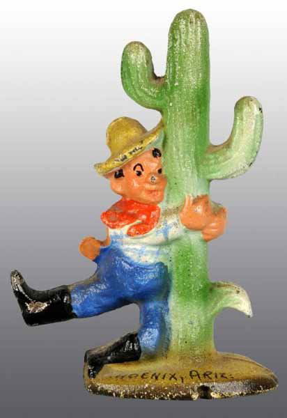 Cast Iron Cowboy Drunk by Cactus Bottle Opener.: Description Made by John Wright Company. Souvenir of "Phoenix Ariz." Condition (Excellent). Size 3 - 3/4" x 2 - 5/8".