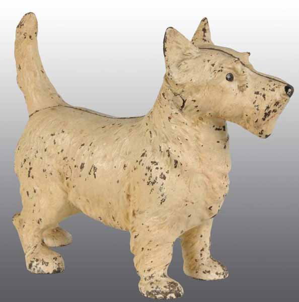 Cast Iron Scottie Doorstop.: Description Made by Hubley, cat. #305. Full-figure. Unusual paint variation. Condition Very Good). Size 9" x 11".