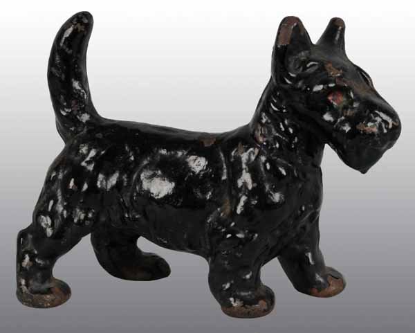 Cast Iron Standing Scottie Doorstop.: Description Made by National Foundry. Full-figure. Condition (Good). Size 5" x 6 - 1/2".