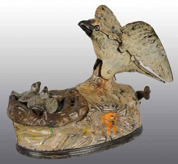Cast Iron Eagle & Eaglets Mechanical Bank.: Description Manufactured by J. & E. Stevens and Company. Bellows still operating. Condition (Excellent).
