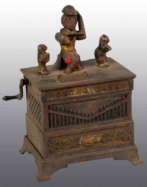 Cast Iron Organ Dog & Cat Mechanical Bank.: Description Manufactured by Kyser & Rex. Broken foot on monkey. Includes keys. Condition (Good).