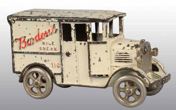 Cast Iron Hubley Borden's Truck Toy.: Description All original with cast iron wheels. Driver is missing. Condition (Excellent). Size 7 - 3/4" L.