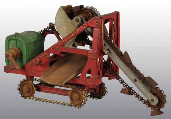 Cast Iron Kenton Buckeye Ditch Digger Toy.: Description Circa 1930. Chain drive and nickel-plated crank. Some of the chain has been replaced with a fair amount of rusting to the plated surfaces. Condition (Very Good). Size 11 - 1/2".