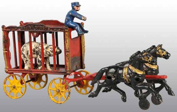 Cast Iron 2-Horse Red Royal Circus Wagon.: Description Includes one polar bear figure. Condition (Excellent). Size 12" L.