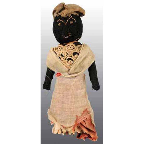 Early Black Girl Pin Cushion Doll.: Circa 1900. Early cloth with clothespin body. 6" T.