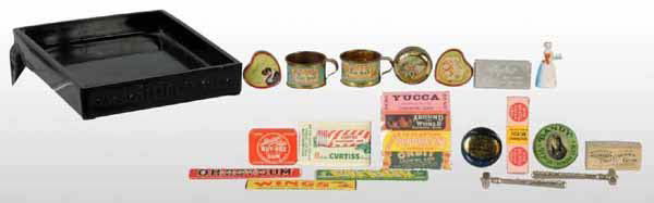 Lot of 21: Dandy Gum & Candy Advertising Pieces.: Includes a Clark's Teaberry Gum display, numerous gum tins, miscellaneous gum wrappers, two scoops, one pencil sharpener, etc. All have minimal to moderate wear throughout. Largest: 6 - 3/4" W.