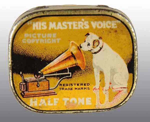 Phonograph Needle Tin.: Rare and desirable piece with exquisite detail. Tin is empty but originally would have held 200 phonograph needles. Some tarnishing to sides but still displays smartly. 1/2" x 1 - 3/8" x 1 - 1/2".