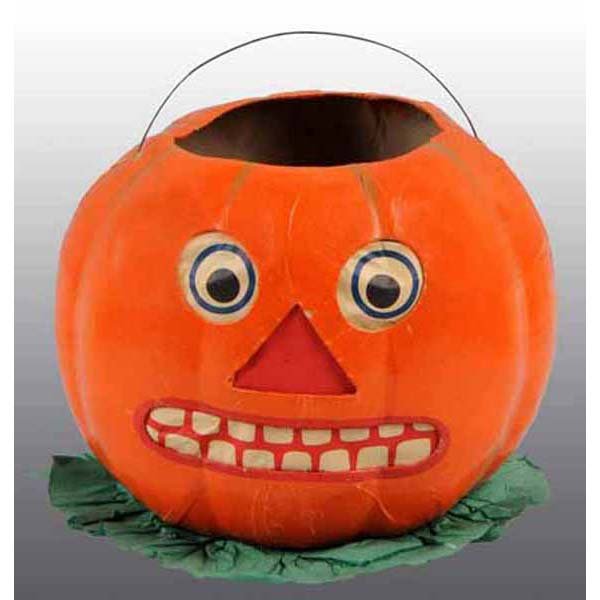 German Halloween Jack-O-Lantern.: Painted composition over paper mache. Has wire bale handle, metal candle holder and printed paper inserts in eyes, nose and mouth. Some tears in eyes and nose. Rare. 8 - 1/4" T.