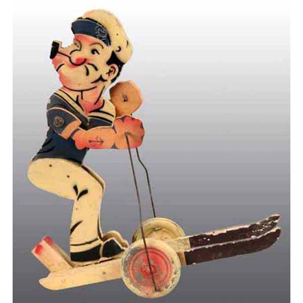 Wooden Popeye Skier Push Toy.: Circa 1930. Made in Spain. Toy has metal wire poles connected to metal wheels, a clicker mechanism in front between skis and the arms move. Has a place with hole in back for a separate push stick but