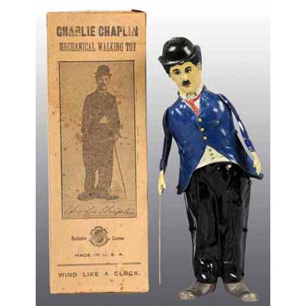 B & R Charlie Chaplin Walker Toy in Orig Box.: Tin. Working. Lithographed tin wind-up with cast iron feet. A photo engraving of Chaplin in his Tramp silent era comedy outfit appears on the box cover above his signature. Below signature it is marke
