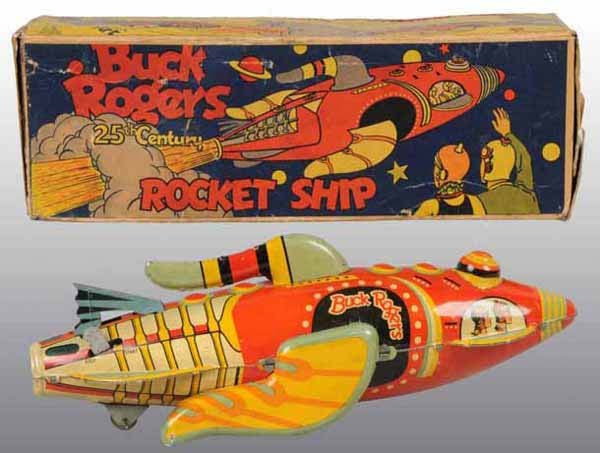 Marx Buck Rogers Rocket Ship Toy in Orig Box.: Tin litho. Circa 1935. Made by Louis Marx Company. Wind-up is working. Needs flint to spark. Excellent red color with no fading. Some play wear but displays excellent. Includes original tail fin and b