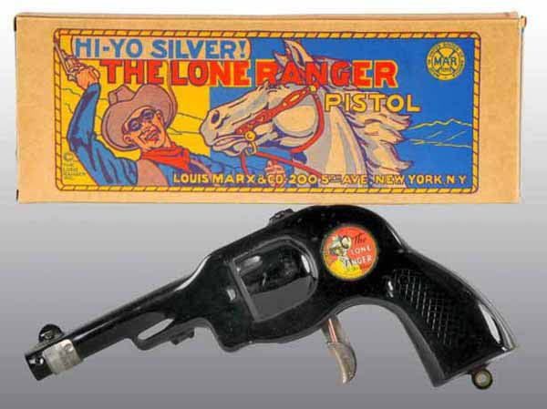 Marx Lone Ranger Toy Clicker Gun.: 1939. Includes original box. Gun has near mint plus decal. 8 - 1/2" L.