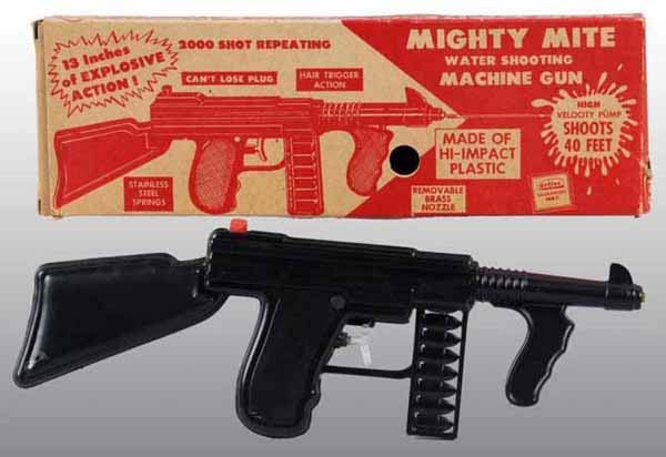 Lot of 2: Toy Water Pistol Guns.: Plastic Tommy gun in original plastic bag attached to card. Mighty Might water shooting machine gun includes original box. Each: 13 - 1/2" L.