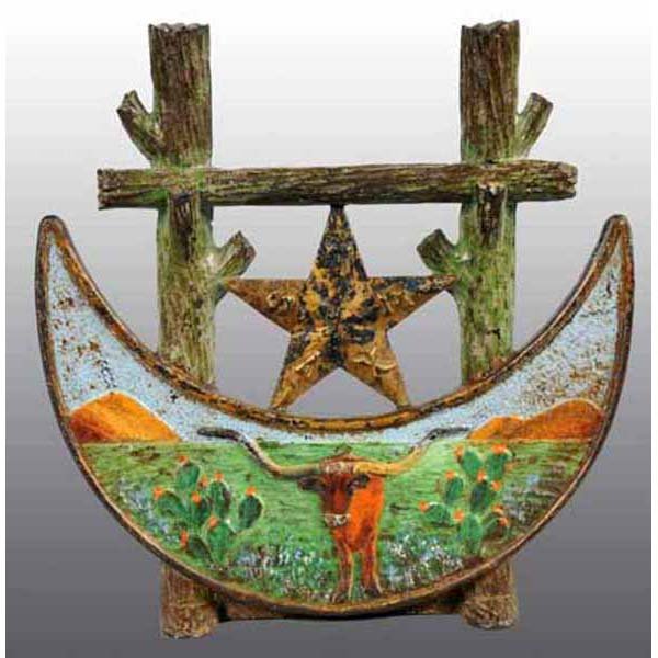 Cast Iron Texas Wedge Doorstop.: Depiction of "Texas" star with crescent moon and a longhorn steer. 10 - 3/8" x 10 - 1/4".