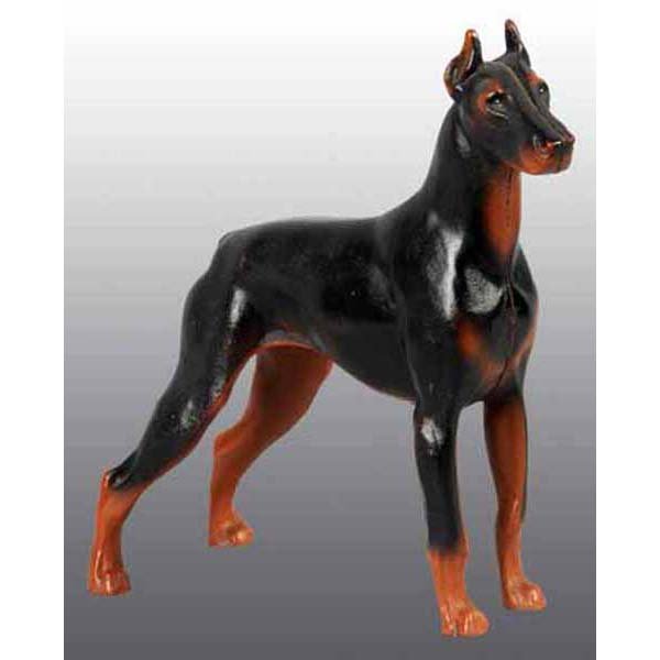 Cast Iron Doberman Pinscher Doorstop.: Made by Hubley, cat. #306. Full figure. Depicts wonderful stance of a Doberman. 7 - 7/8" x 7 - 5/8".