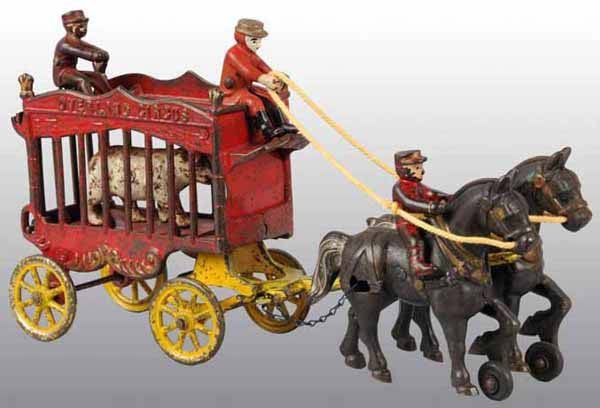 Cast Iron 2-Horse Overland Circus Cage Wagon Toy.: Includes polar bear and three figures. 13 - 1/2" L.