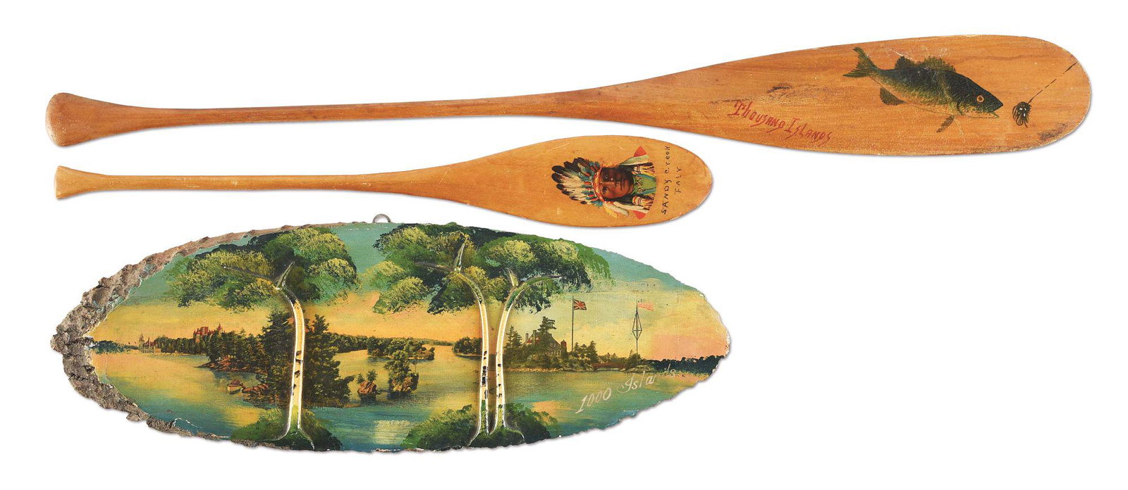 LOT OF 3: EARLY FOLK ART FISHING-THEMED ITEMS.: Nice lot 3 early folk art fishing themed items, including 2 souvenir paddles, 1 has Indian chief with headdress and 1 has a fish, which is marked "Thousand Islands". The last item is a made in U.S.A p