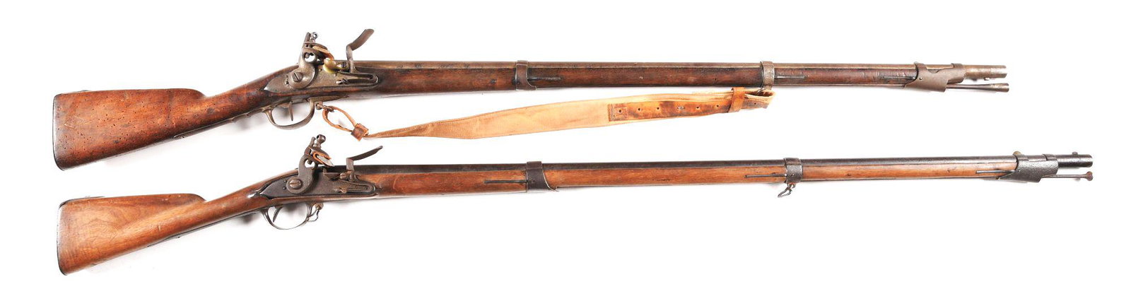 (A) LOT OF 2: FRENCH CHARLEVILLE FLINTLOCK MUSKETS.: Lot consits of (A) Standard Model 1815 Charleville flintlock musket. Stock dated 1815. CONDITION: Unmarked barrel with a mostly brown patina. Lock is in its original flintlock configuration and with e
