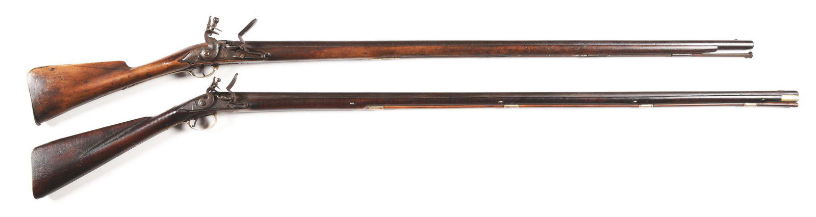 (A) LOT OF 2: SILVER MOUNTED AMERICAN FLINTLOCK FOWLER: Lot consists of (A) Continental flintlock musket or trade gun. Unmarked tapered round barrel with bayonet lug mounted on top, near muzzle. The origin of the faux British lock is unknown, but there is 