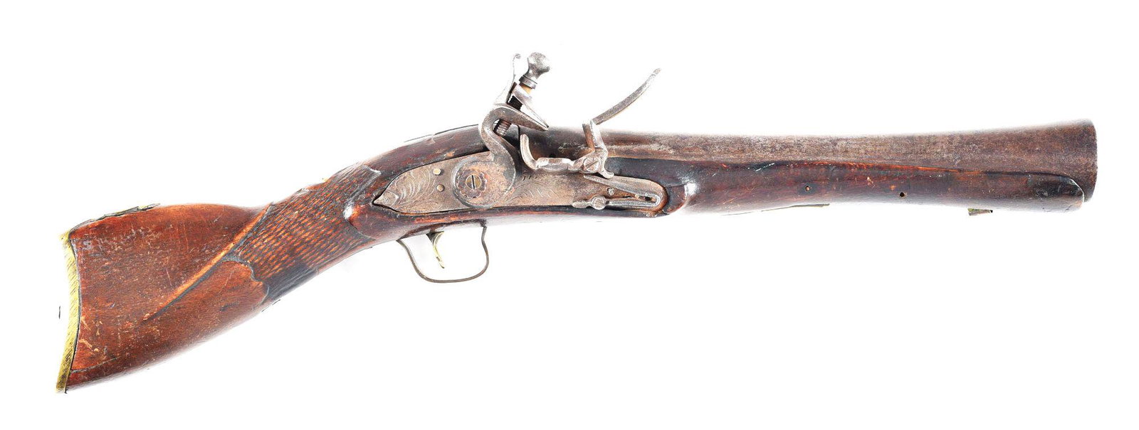 (A) A MIDDLE EASTERN FLINTLOCK BLUNDERBUSS, MOST LIKELY: Crudely manufactured with iron lock and barrel with brass furniture. Flint lock with swan neck cock with what appears to be a cog washer. Wood has checkered wrist. Saddle ring on sideplate. Wrist has 