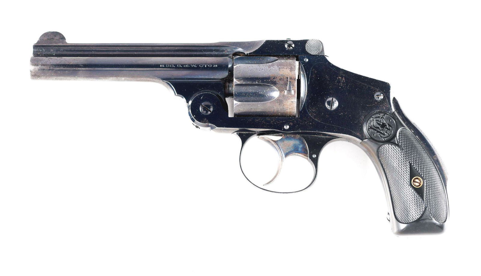 (C) SMITH & WESSON "LEMON SQUEEZER" SAFETY HAMMERLESS: Fifth Model Safety Hammerless double action only revolver manufactured from 1907 to 1940. Blued finish 4” barrel with single line address, “.38 S. & W. CTG” marking and integral half moon front