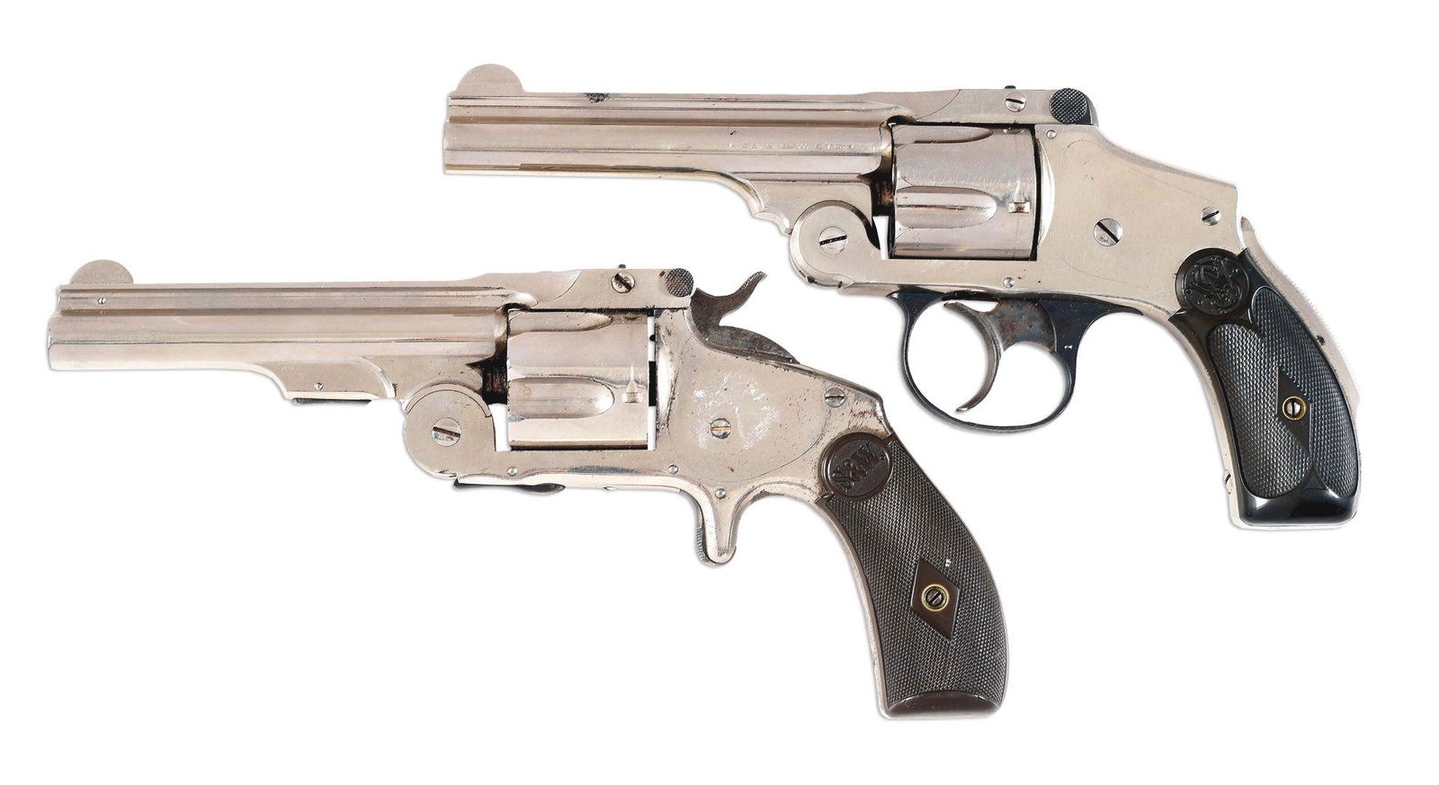 (C) LOT OF TWO: SMITH & WESSON SAFETY HAMMERLESS: Lot consist of: (A) Smith & Wesson Safety Hammerless Fifth Model double action revolver. Formally called the "New Departure" and sometimes jokingly the "Lemon Squeezer". Made circa 1908. Barrel rib ma