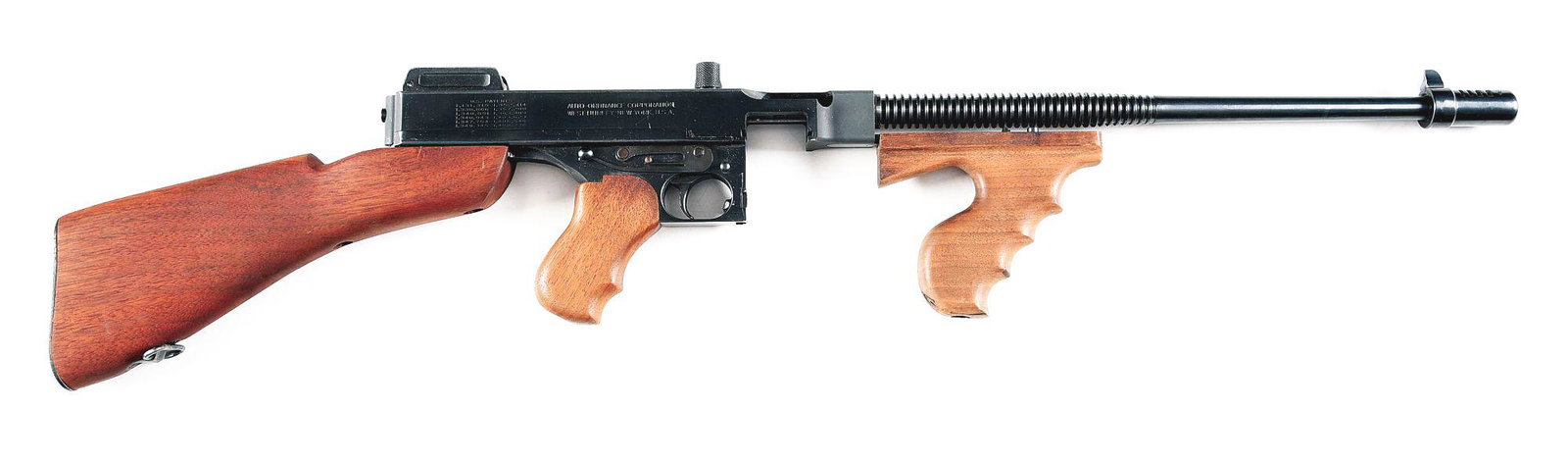 (M) AUTO ORDNANCE MODEL 1927 A1 SEMI-AUTOMATIC CARBINE.: Classic configuration of the 1927A1 Thompson as reproduced by Auto Ordnance. Compensator with front sight dovetailed in vertically. Ribbed ventilated barrel. Finger groove foregrip and pistol grip. Op
