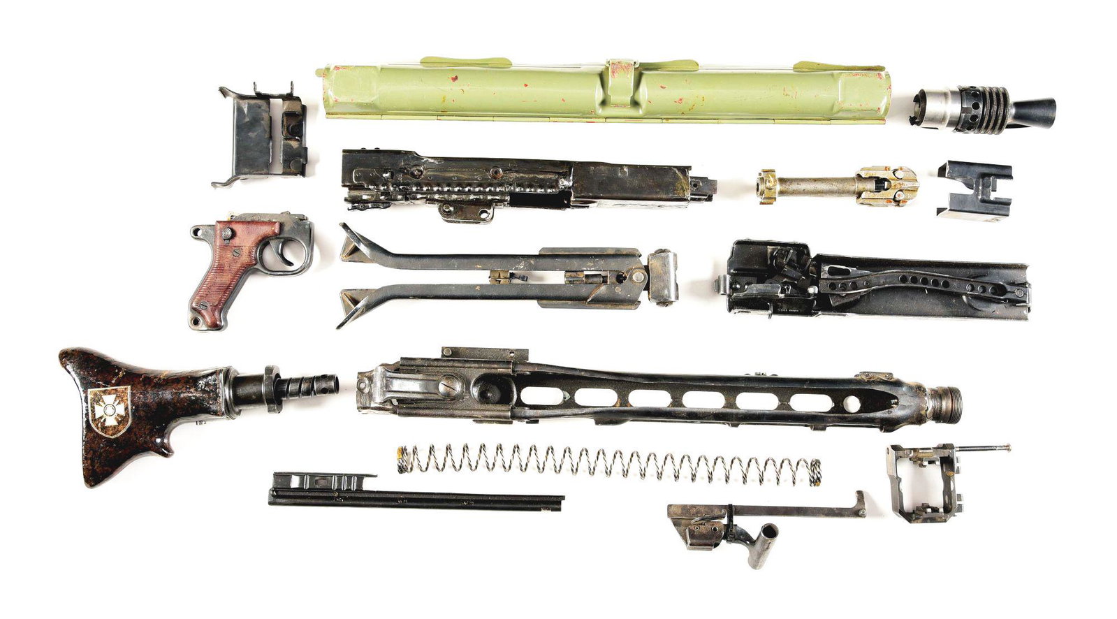 “MALTESE CROSS” MG-42 MACHINE GUN PARTS KIT WITH LONG: Very attractive set of parts for MG-42 machine gun including bakelite butt with attractive Maltese cross, adjustment knob bipod, good intact muzzle attachment with remnant of receiver with threads int