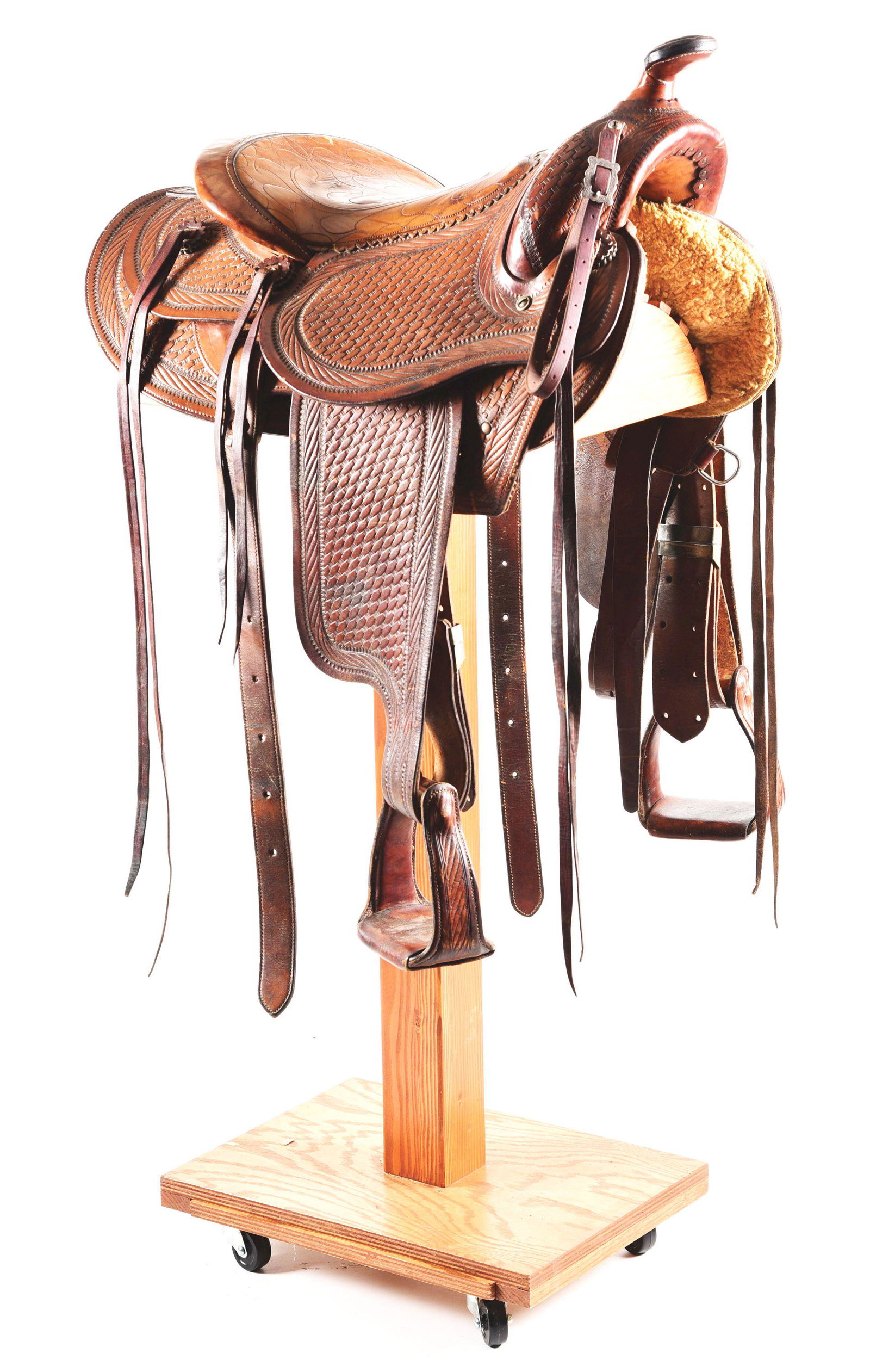 BOHLIN SADDLE.: Edward Bohlin was known as the saddlemaker to the stars. Gene Autry and Tom Mix were some of his customers and friends. He was famous also for his silver parade saddles. This is a Bohlin-made western