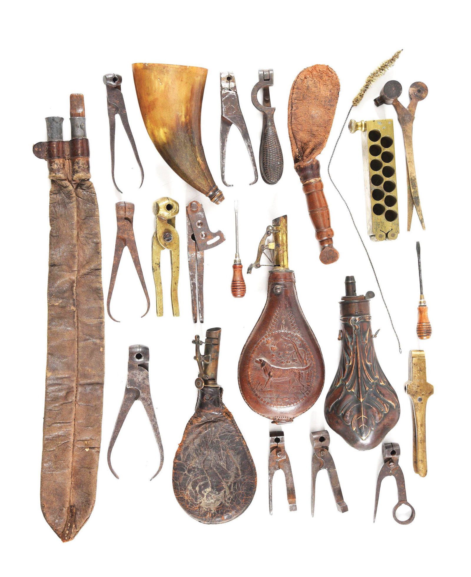 LARGE LOT OF BULLET MOLDS AND POWDER FLASKS: Lot consists of: (A) 7 black smith made bullet molds of various calibers and sizes. (B) 3 unmarked brass bullet molds. (C) .36 caliber Colt type mold missing screw with heavy rust. (D) 4 leather shot