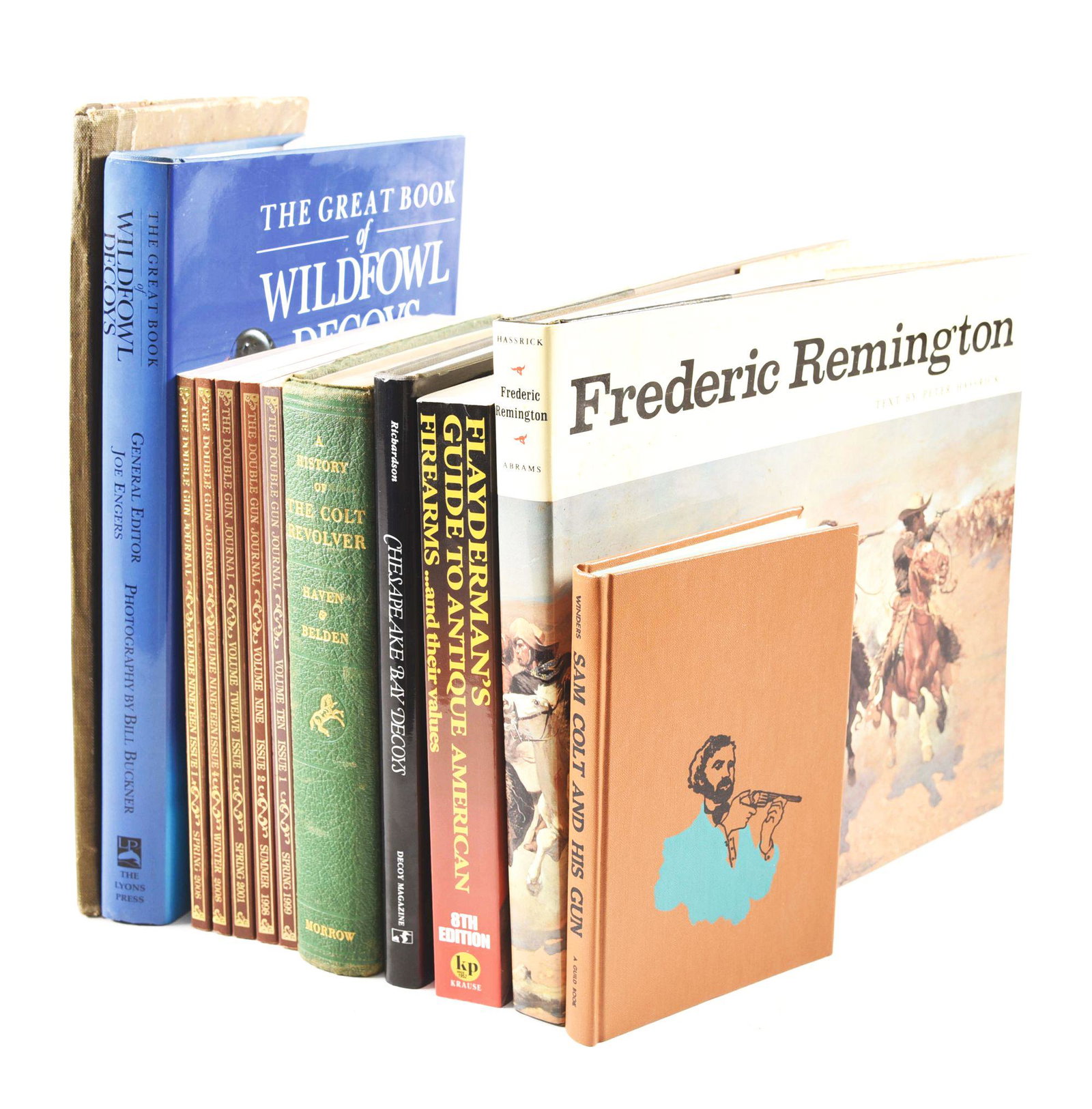 LOT OF 12: FIREARMS & HUNTING RELATED BOOKS.: Lot consists of "A History of the Colt Revolver From 1836 to 1940" by Haven & Belden (1940); "Sam Colt and His Gun" by Winders (1959); "The Great Book of Wildfowl Decoys" by Engers (2000); "Chesapeake
