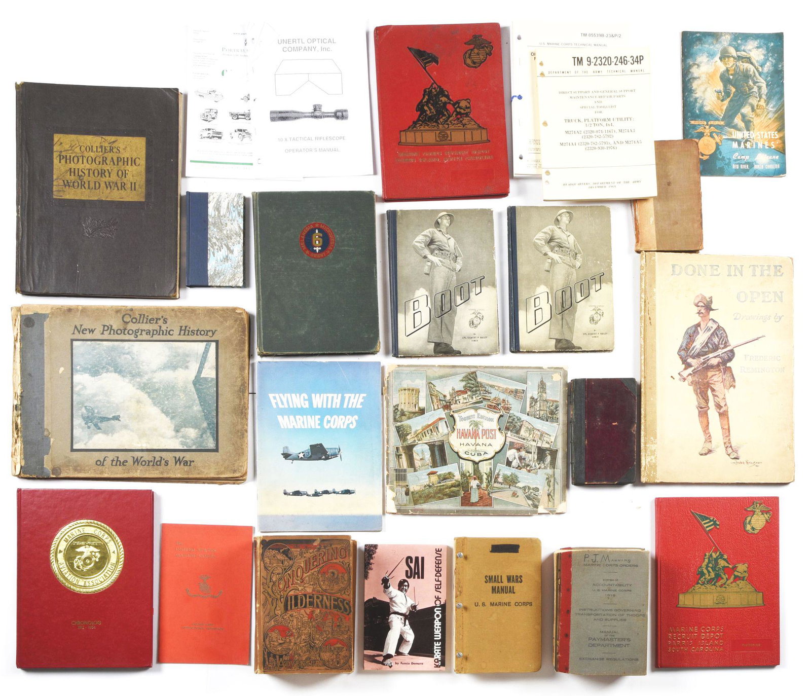 LARGE LOT OF USMC RELATED BOOKS: Lot consists of 25 U.S. Marine Corp and related topic books and pamphlets: (A) "Done in The Open Drawings By Frederic Remington", Collier's, 1902. (B) "Conquering The Wilderness Pioneer Heroes and Her