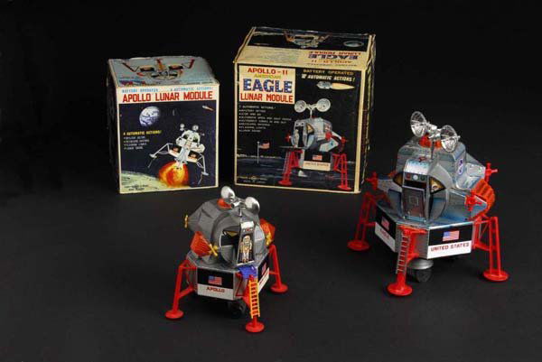 Lot of 2: Apollo Lunar Modules.: Description Japanese. Made by DSK. Both are working. Both have wear throughout. Includes two original boxes with creasing and wear throughout. Condition (Excellent - Near Mint). Size Largest: 10" T.