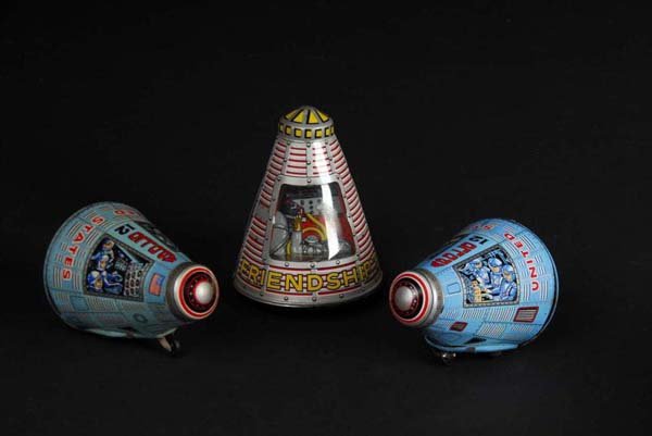 Lot of 3: Tin Space Capsule Friction Toys.: Description Japanese. All are working. Includes two Apollo 12's and one Friendship 7. Condition (Very Good - Excellent). Size All: 2" T.