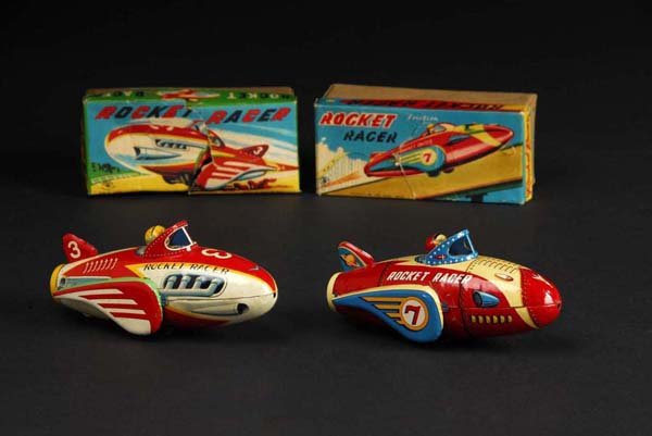 Lot of 2: Tin Rocket Race Friction Toys.: Description Japanese. Made by Masudaya. Both are working. Includes two different lithographed versions of the same toy. When pushed, toys make a clicking noise. Very nice lithography with very little