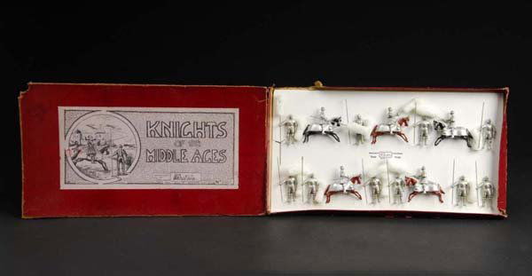 Britains Knights of the Middle Ages Soldier Set.: Description 15 figures in set consists of 5 knights on horseback and ten knights holding lances. Includes original box with beautiful label showing a knight on horseback and original insert. Box is mi