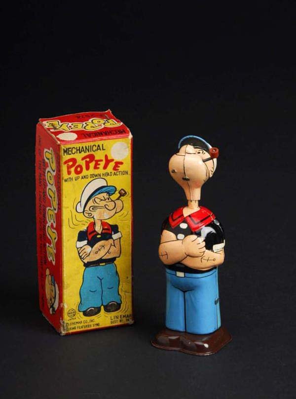 Tin Linemar Popeye Up & Down Head Wind-Up Toy.: Description Japanese. Working. Marked "King Features Syndicate" on back. When wound, Popeye's head goes up and down. Original pipe. Some oxidation to attached key. Includes original box with some slig