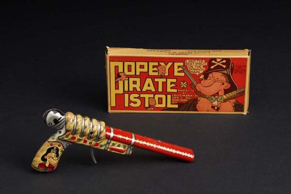 Tin Marx Popeye Pirate Pistol Toy.: Description American. Working. Very little wear overall. Includes original box with beautifully colored graphics. Two side tabs are missing from one end of box. Condition (Very Good - Excellent). Size