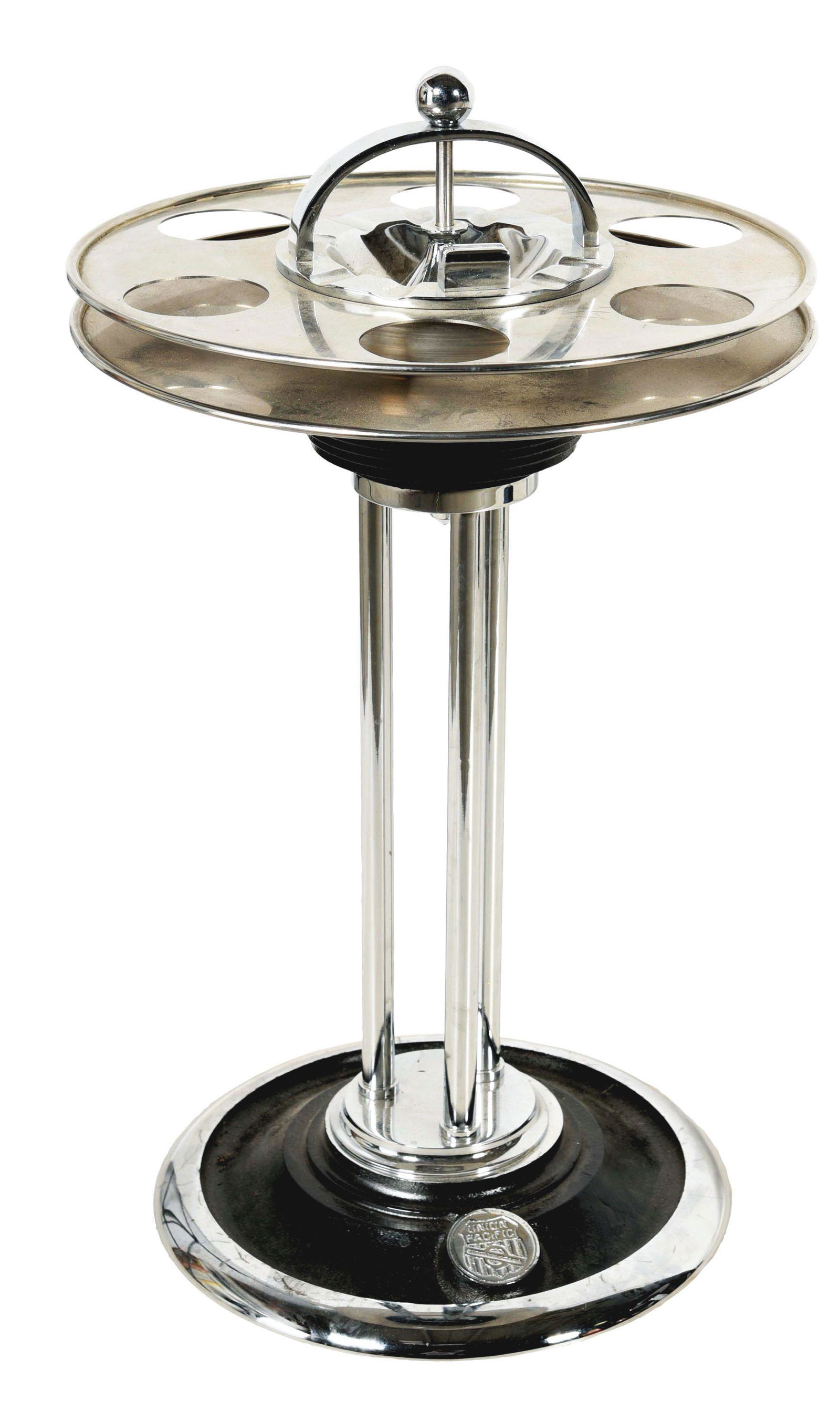 UNION PACIFIC LOUNGE CAR DRINK STAND AND ASH RECEIVER.: Marked with "UP overland shield logo" in medallion on heavy base. Six drink receptacles in aluminum top with ash receptacle in center. 1930's vintage. Remarkable condition considering age and use. Con
