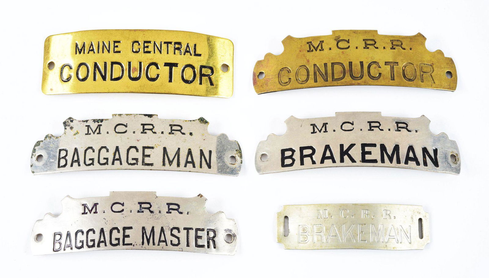 MAINE CENTRAL HAT BADGES. (1 of 2)