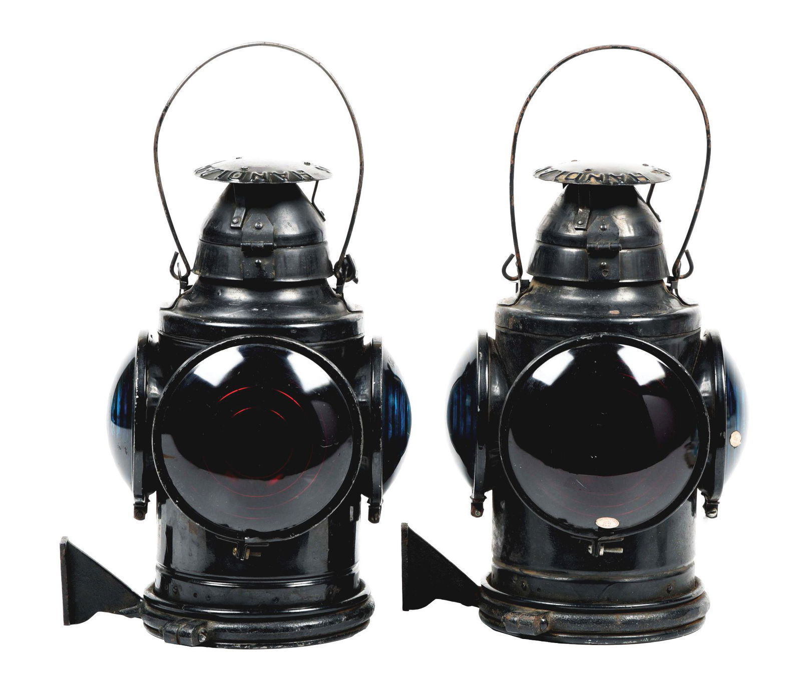 PAIR OF MILWAUKEE MARKER LAMPS.: Made by Handlan-Buck and each embossed "CMStP&PRR" on the sliding door, each has three green and one larger red lens, oil founts/burners and brackets intact. Condition: (7.0). Dimensions: Each: 15" x