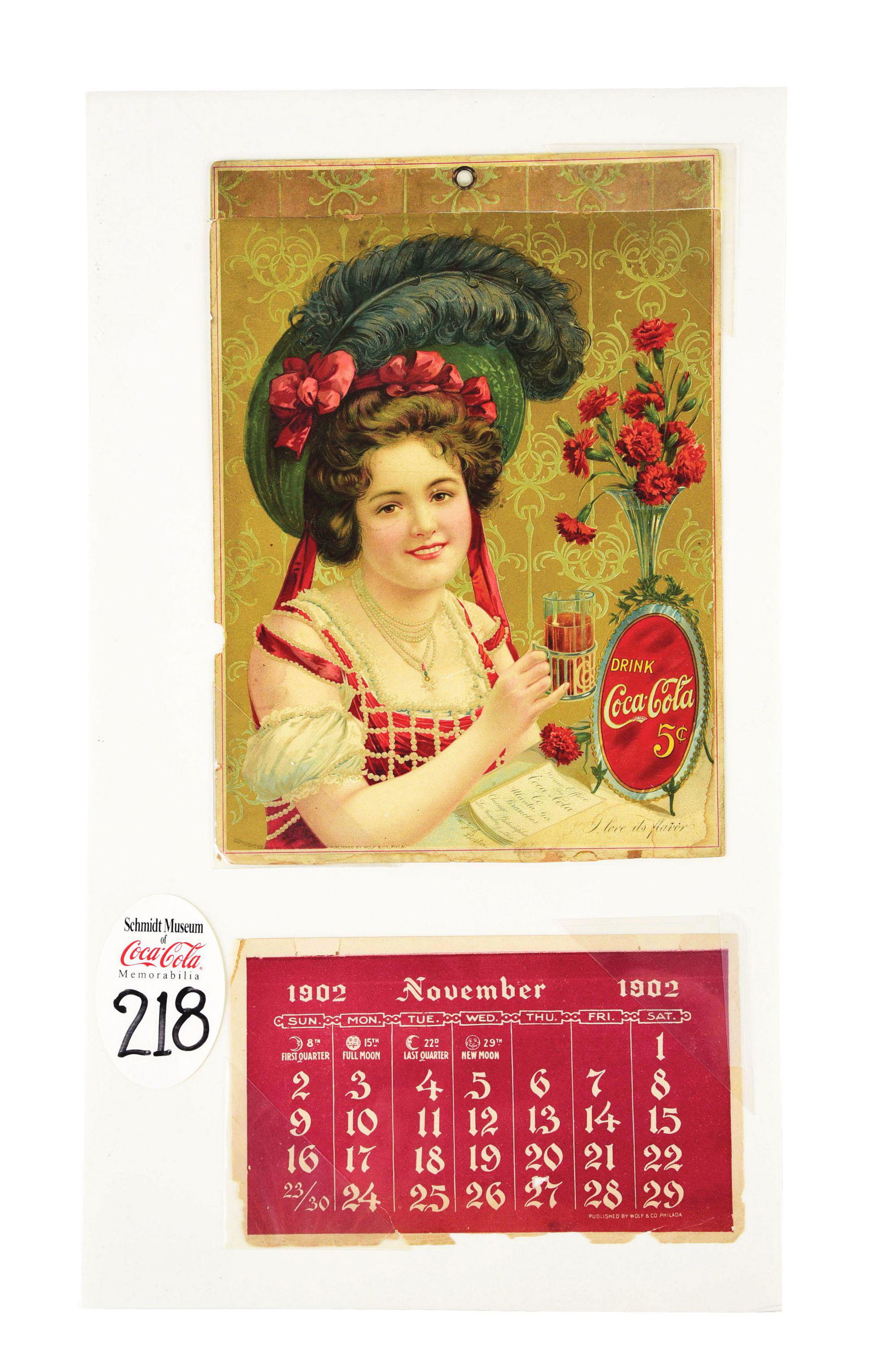 1902 CALENDAR TOP WITH A REMNANT OF THE 1902 CALENDAR. (1 of 2)