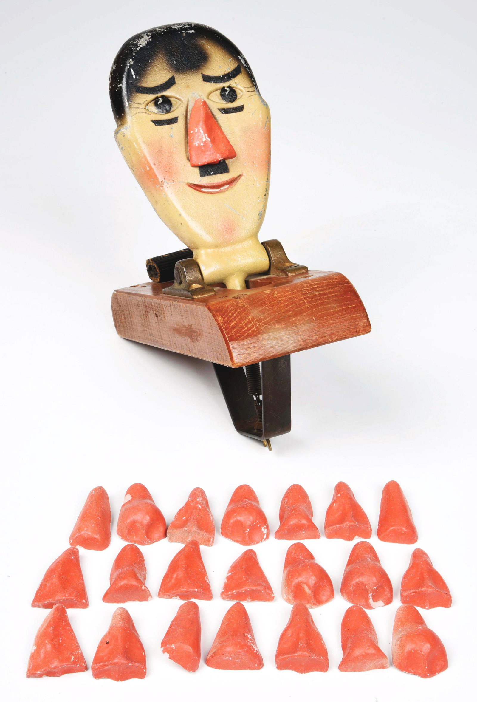 HITLER CARNIVAL ARCADE TARGET.: This is a very interesting arcade target, probably from the 1940's, with a likeness of Hitler that people threw baseballs at. When hit, Hitler's head goes back and normally there would be a bell that 