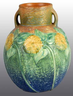 Roseville Sunflower Pottery Vase.: Description Nice color and form. No damage or repairs. Condition (Excellent). Size 9" T.
