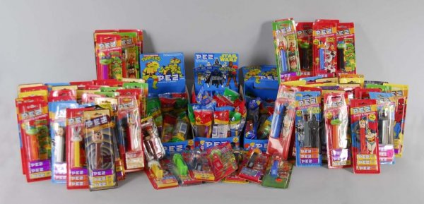 Large Lot of Assorted Pez Dispensers.: Description Packaged. Condition (Near Mint - Mint).