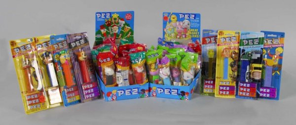 Large Lot of Pez Dispensers.: Description Most are in original packages.