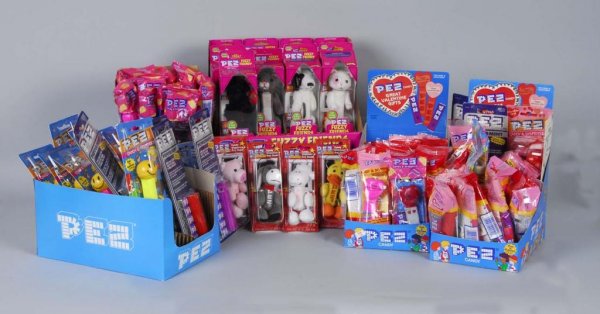 Large Lot of Pez Dispensers.: Description Includes some boxed and packaged.