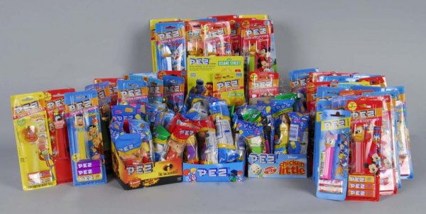 Large Lot of Pez Dispensers.: Description Most are in original packages. Condition (Near Mint).